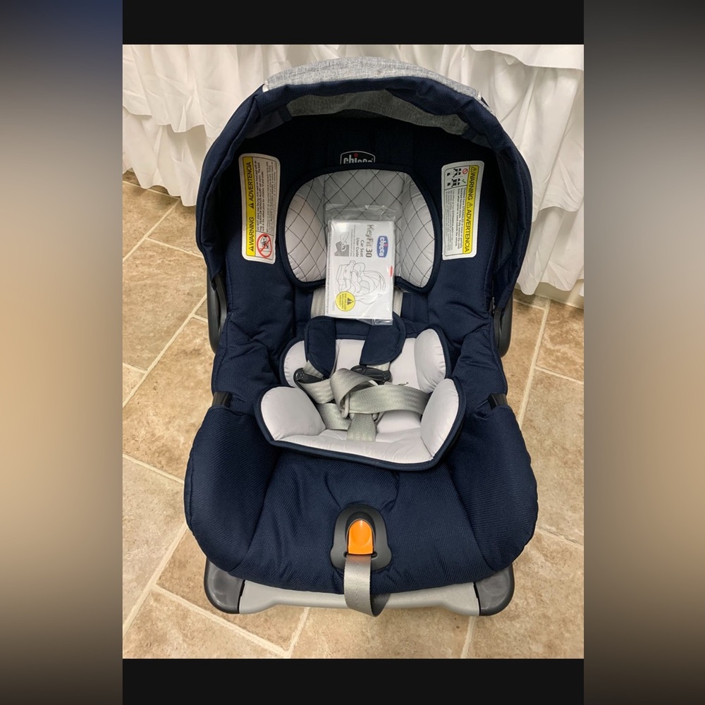 New car seat with base in a box